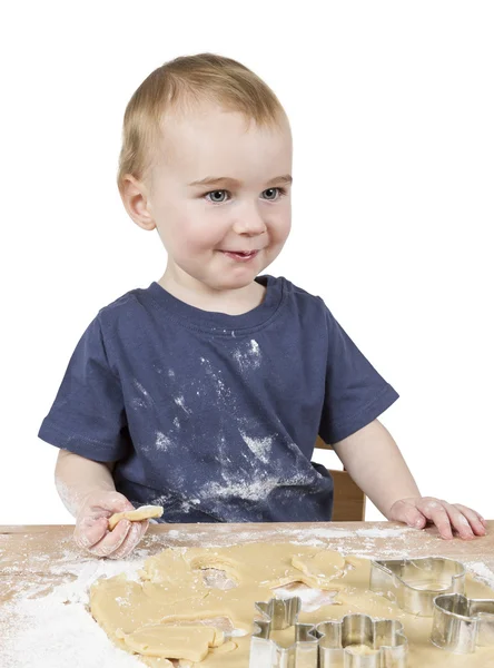 Bambino che fa biscotti — Foto Stock