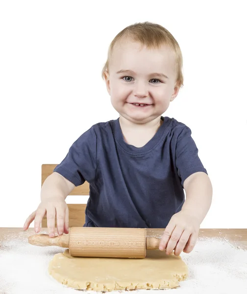 Niño haciendo galletas — Foto de Stock