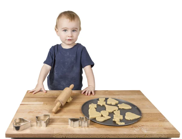 Niño haciendo galletas — Foto de Stock