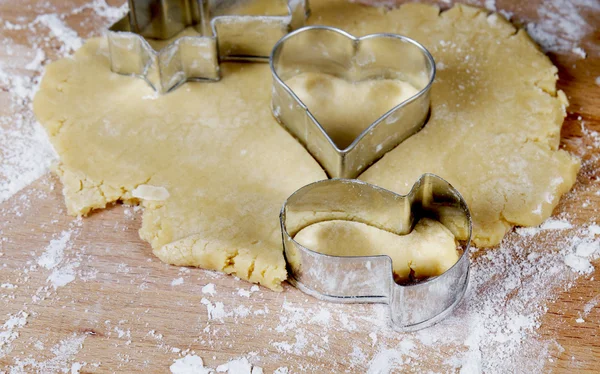 Making cookies on wooden desk — Stock Photo, Image