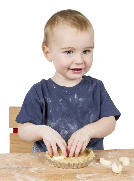 Criança fazendo biscoitos — Fotografia de Stock