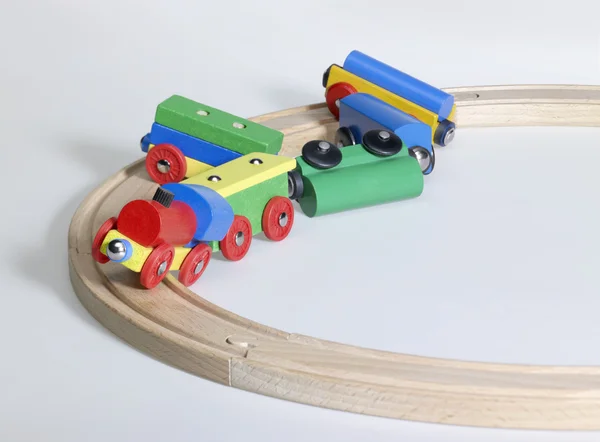 Colorful wooden toy train and tracks — Stock Photo, Image