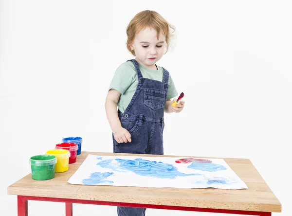 Child looking at painting — Stock Photo, Image