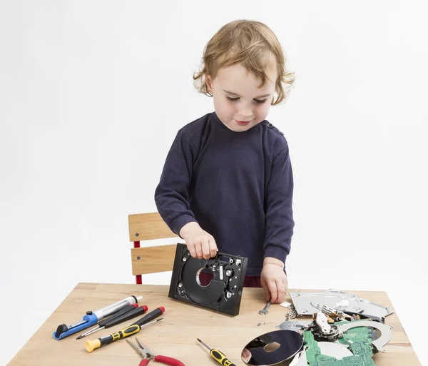 Computer parts on wooden desk — Stock Photo, Image