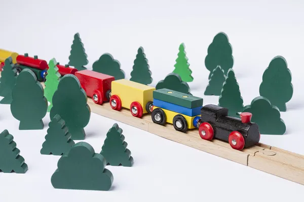 Fast train driving through small forest — Stock Photo, Image