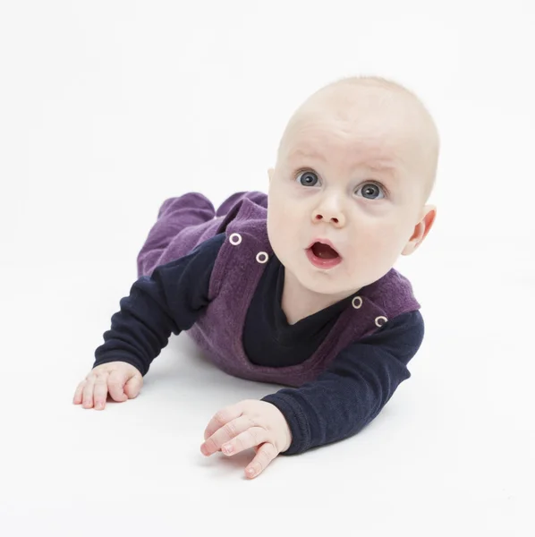 Sorpresa bambino sul pavimento — Foto Stock