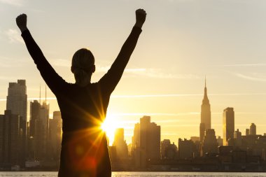 Successful Woman Sunrise New York City Skyline clipart