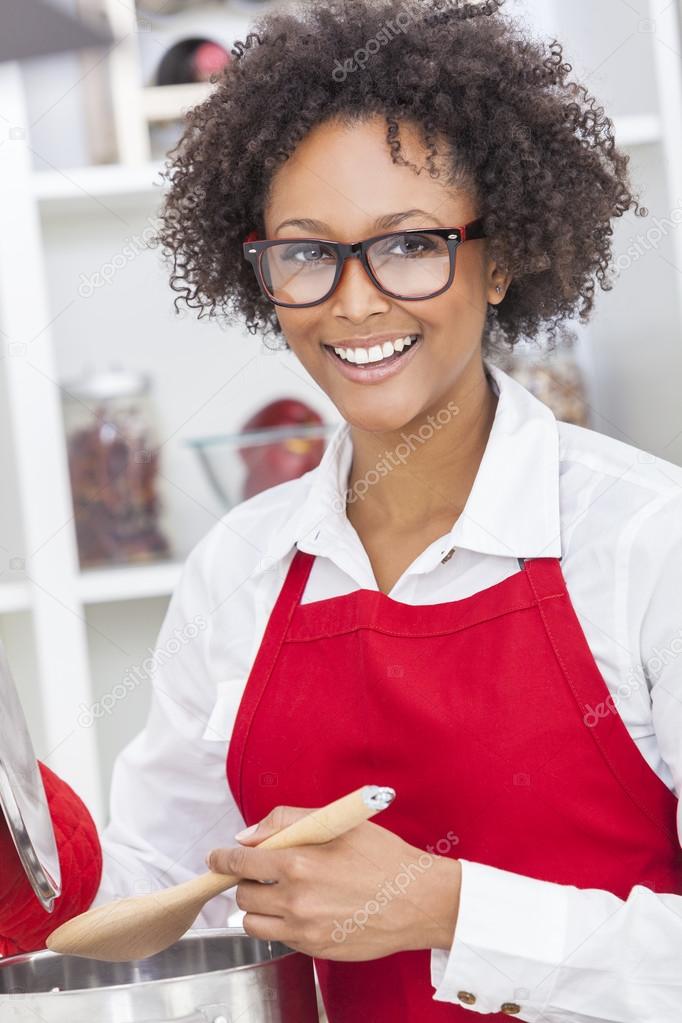 African American Woman Cooking Kitchen — Stock Photo © dmbaker #39270021
