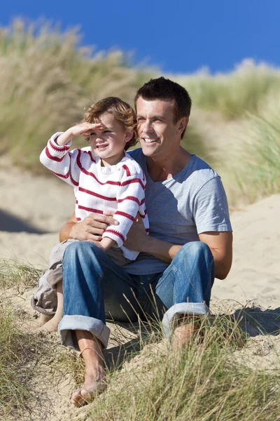 Father and son in sand dunes — Stock Photo, Image