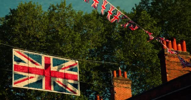 Union Jack Flags Flying Houses Streets Britain Vintage Lut Slowmotion — Video Stock
