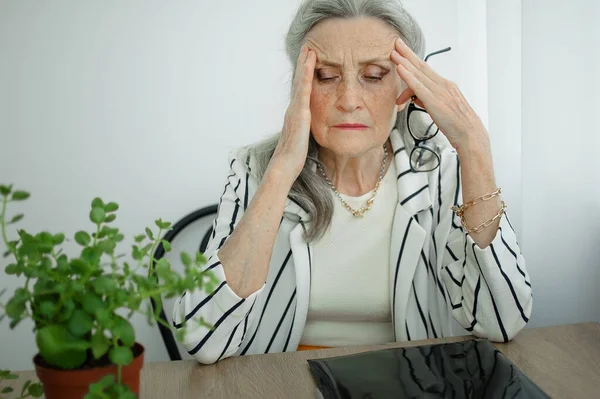 Tired Senior Grey Haired Businesswoman Striped Jacket Eyeglasses Working Her Stock Photo