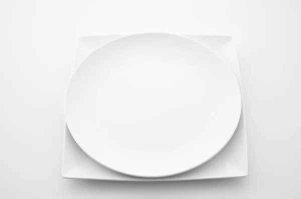 Porcelain plate on white background — Stock Photo, Image