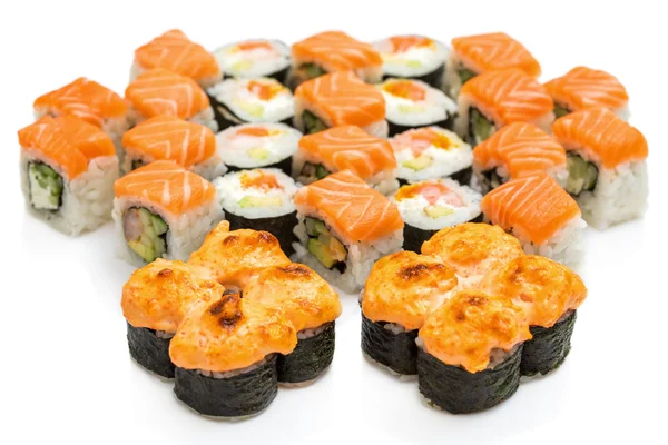 Set di involtino di sushi, con ombre e riflessione su uno schienale bianco Fotografia Stock