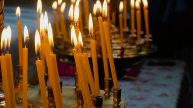 Burning candles in the Christian Orthodox Church. The theme of religion, faith and the Orthodox Church