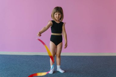 Rhythmic gymnastics for children. Sports club for girls