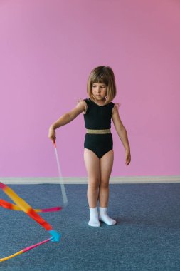 Future champion in rhythmic gymnastics. Childrens sports competitions. Childrens training