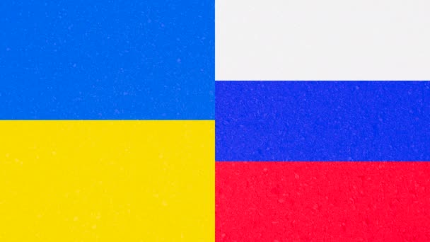 Blut tropft auf die Flagge der Ukraine und Russlands. Plakat zum Ukraine-Krieg — Stockvideo