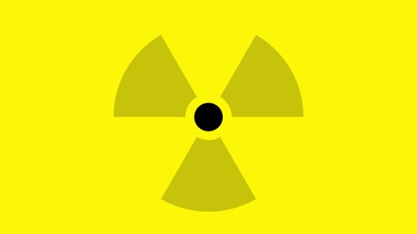 Signo de radiación sobre un fondo amarillo. Riesgo de guerra nuclear y contaminación radiológica — Vídeos de Stock