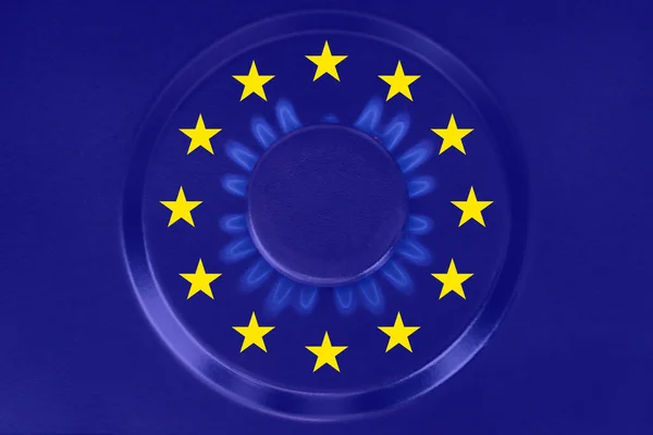 Gas luka bakar dengan latar belakang bendera Uni Eropa Stok Foto Bebas Royalti