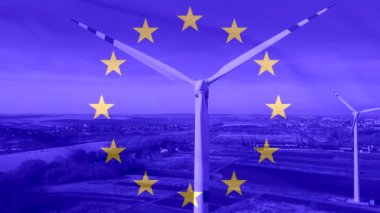 Massive wind turbine - aerial close up against the background of the EU flag
