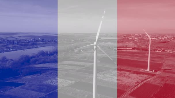 Wind energy farm against the background of the France flag — Stock video