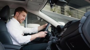 A man examine vehicle before making purchase. Buy car
