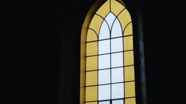 Interior and stained glass windows in church — Vídeos de Stock