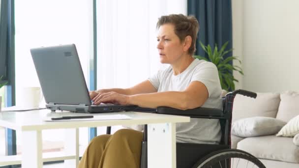 Motivated Senior Freelancer Working Typing Laptop Sitting Wheelchair Home — Stock Video