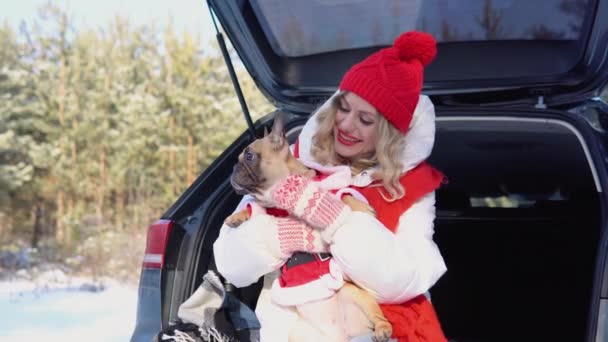 Young Woman Dog Sitting Open Trunk Car Winter Forest Vacation — Stockvideo