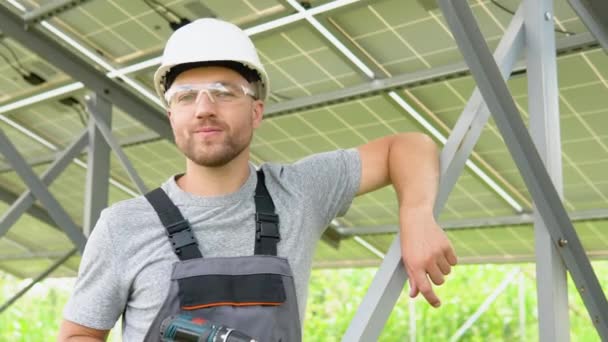Male Engineer Protective Helmet Installing Solar Photovoltaic Panel System Using — Video