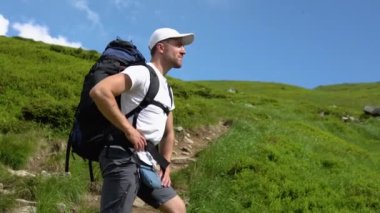 Happy hiker winning reaching life goal, success, freedom and happiness, achievement in mountains. Himalayas. Nepal