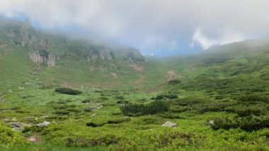 Clouds rolling over the mountain
