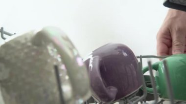 Filling dirty dishes in the dishwasher. Timelapse, 4K