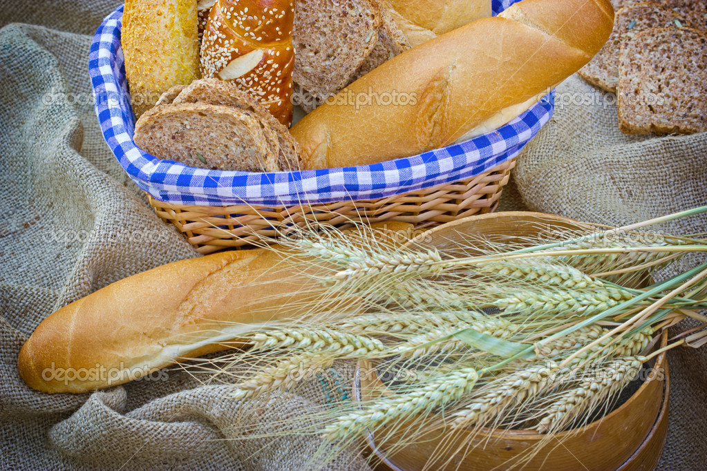 Various bread and pastry on the table — Stock Photo © lola19 24359379