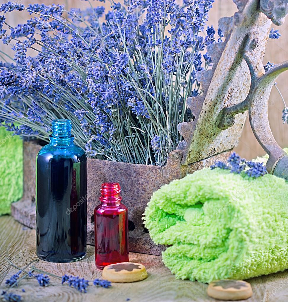 Lavender oil (aromaticessential oil) and lavender Stock Photo by