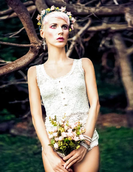 Fashion portrait of a sexy girl in the forest — Stock Photo, Image