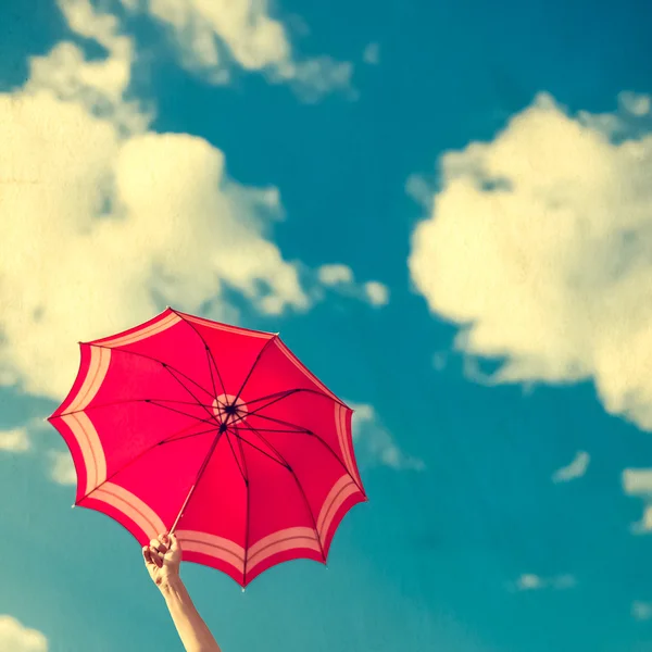 Vintage paraply i den blå himmel - Stock-foto