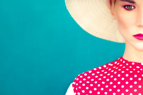 Close-up portrait of retro girl on the blue background — Stock Photo, Image