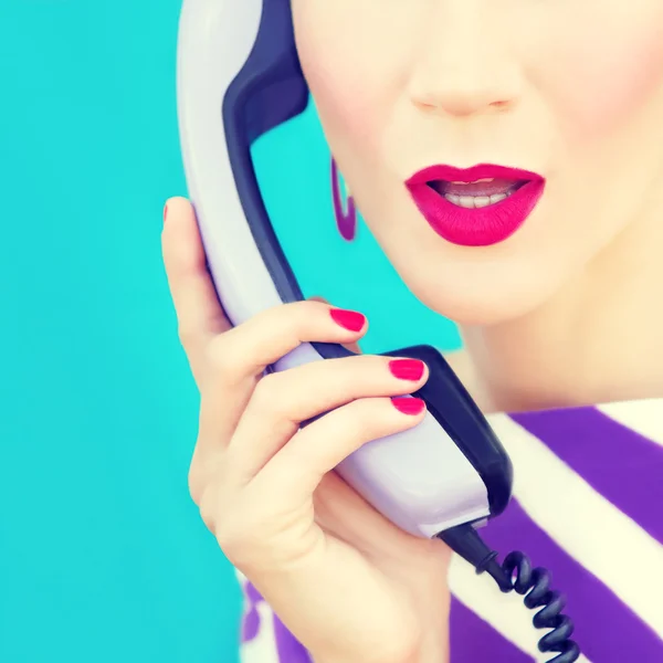 Close-up portrait of a retro girl with telephone — Stock Photo, Image