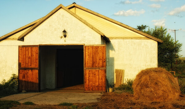 Facade of the stables at sunset