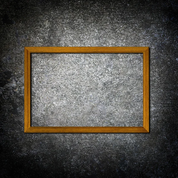 Picture frames on concrete wall — Stock Photo, Image