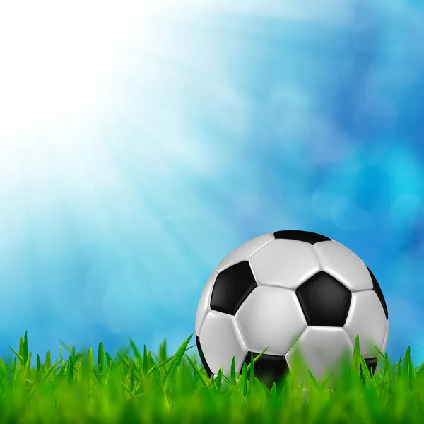 Fotboll i gröngräset bakgrund — Stockfoto