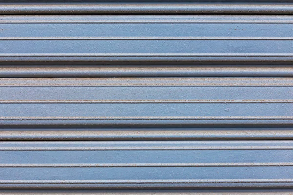 Vintage old blue paint on the garage door. invoice. background. place for text — Stock Photo, Image