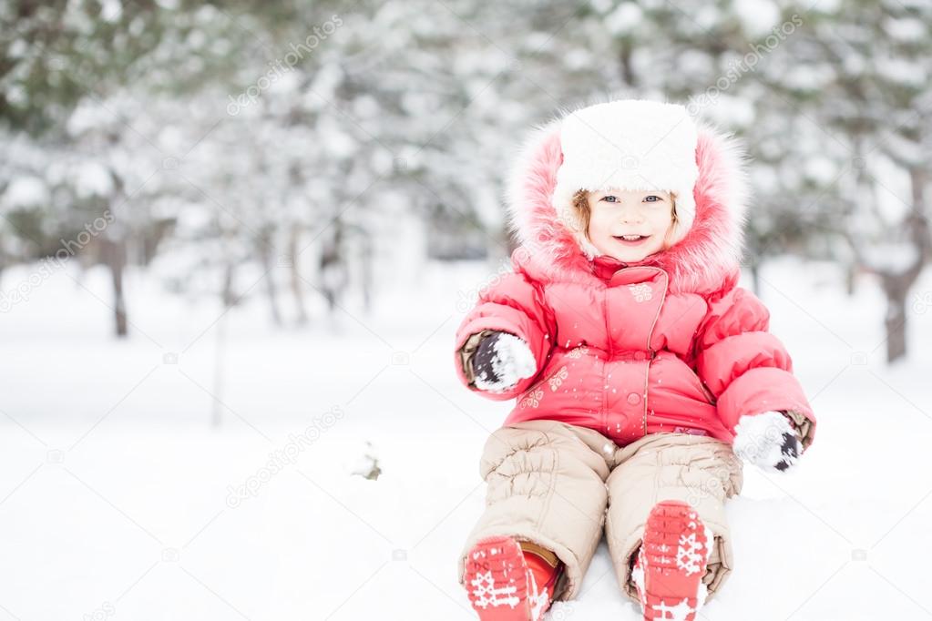 Full length portrait of happy child in winter park