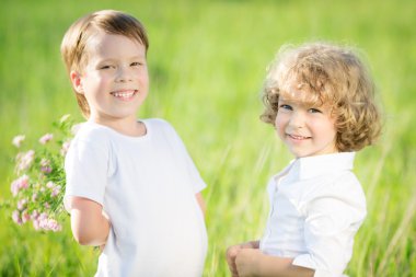 Happy children with flowers