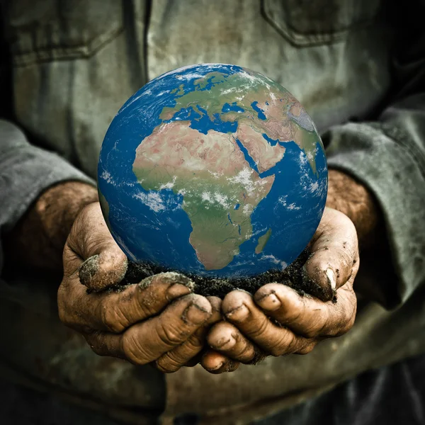 Earth in hand — Stockfoto