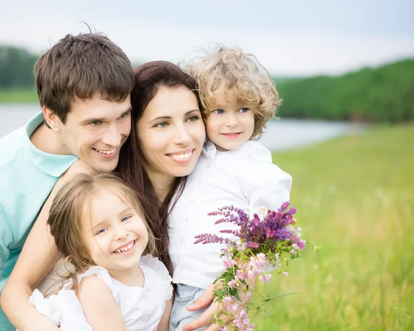 Happy family outdoors Stock Image
