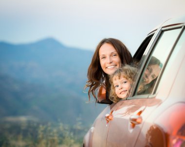 Happy family travel in car