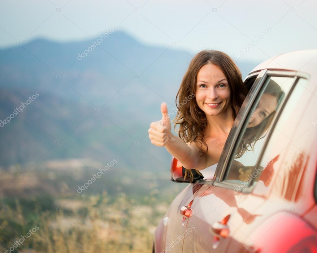 Happy driver woman on summer vacation