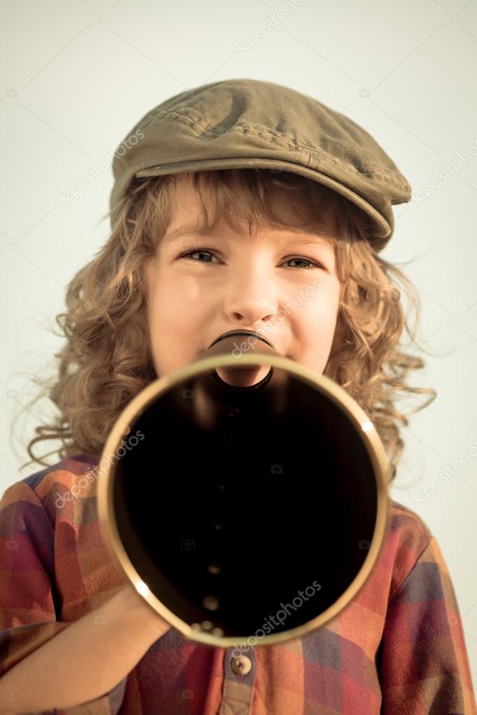 Kid shouting through megaphone